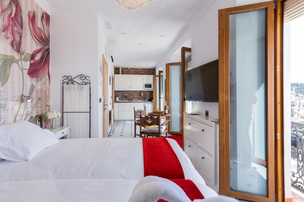 Cama o camas de una habitación en Salamandra Plaza