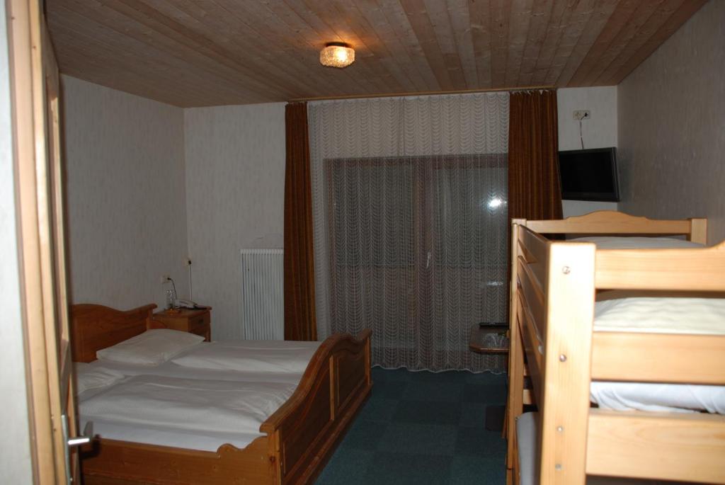 Postel nebo postele na pokoji v ubytování Pension Bäuerle