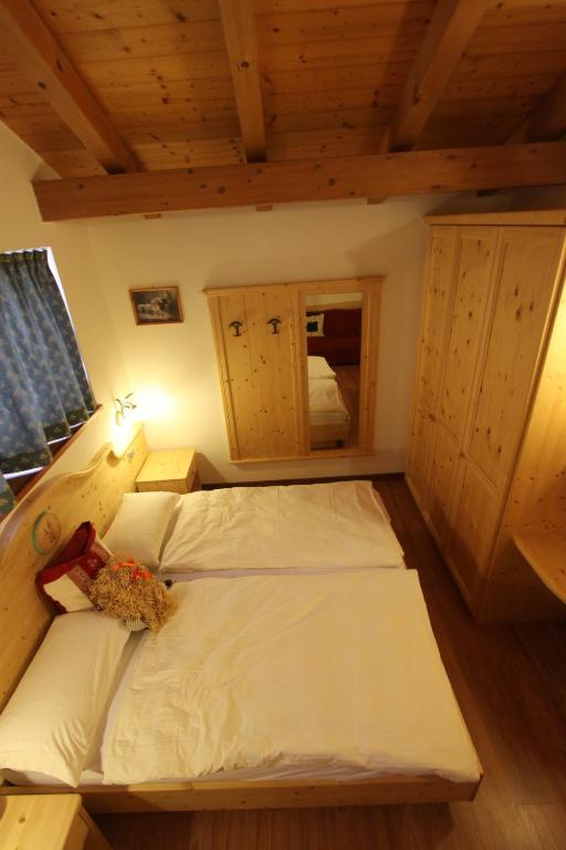 Postel nebo postele na pokoji v ubytování B.& B. Corradini