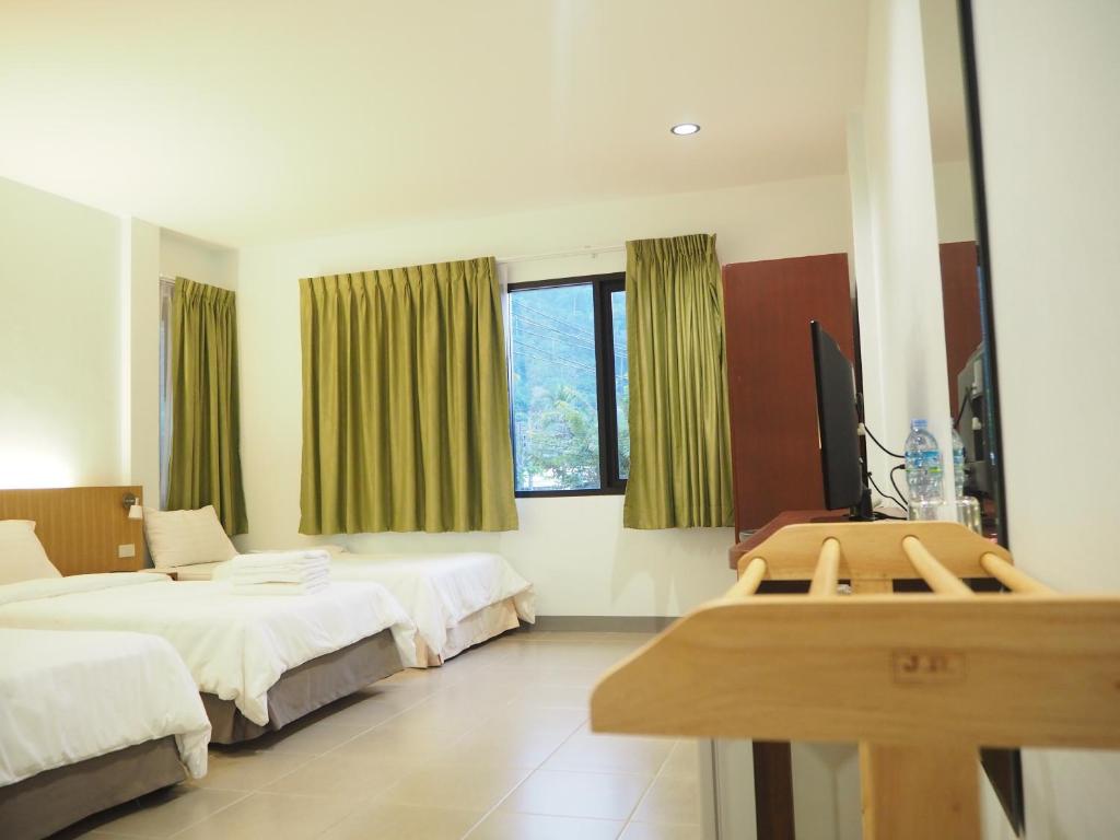 Postel nebo postele na pokoji v ubytování Wandee Bed & Breakfast