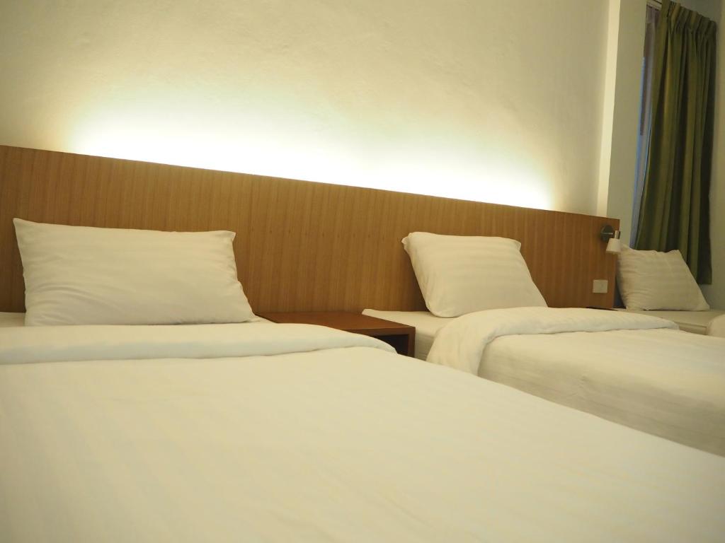 Postel nebo postele na pokoji v ubytování Wandee Bed & Breakfast