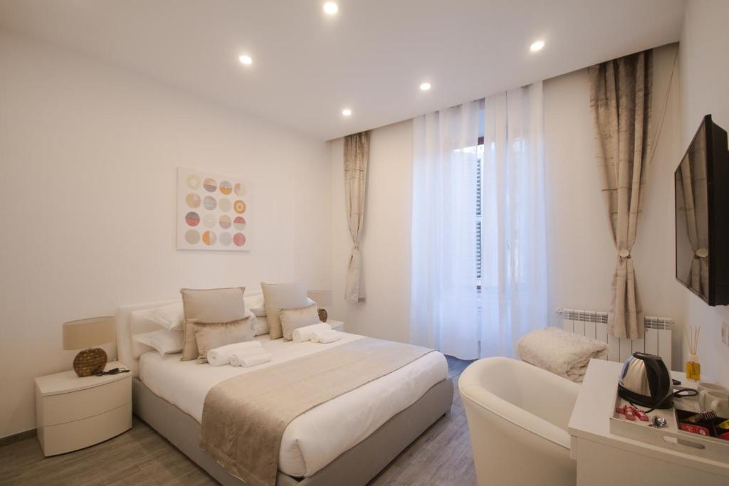 Postel nebo postele na pokoji v ubytování Trastevere Sweet Dream