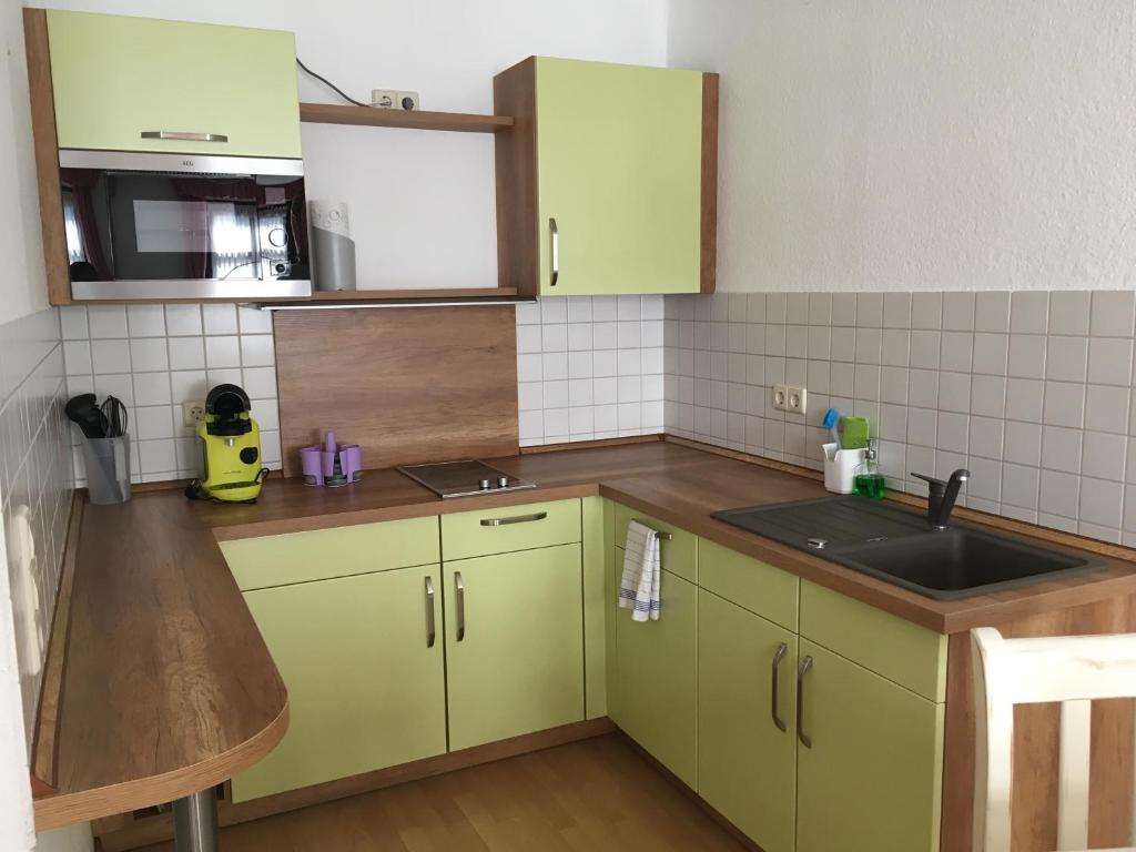 Kuchyň nebo kuchyňský kout v ubytování Hotel Alt Annaberg