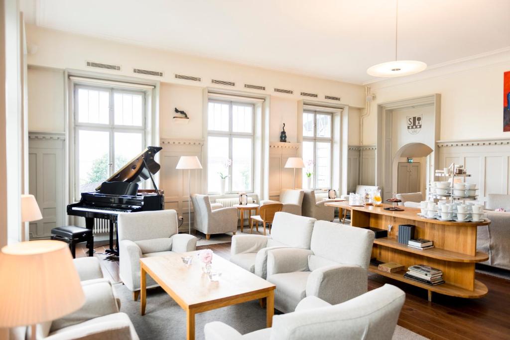Posezení v ubytování 1909 Sigtuna Stads Hotell