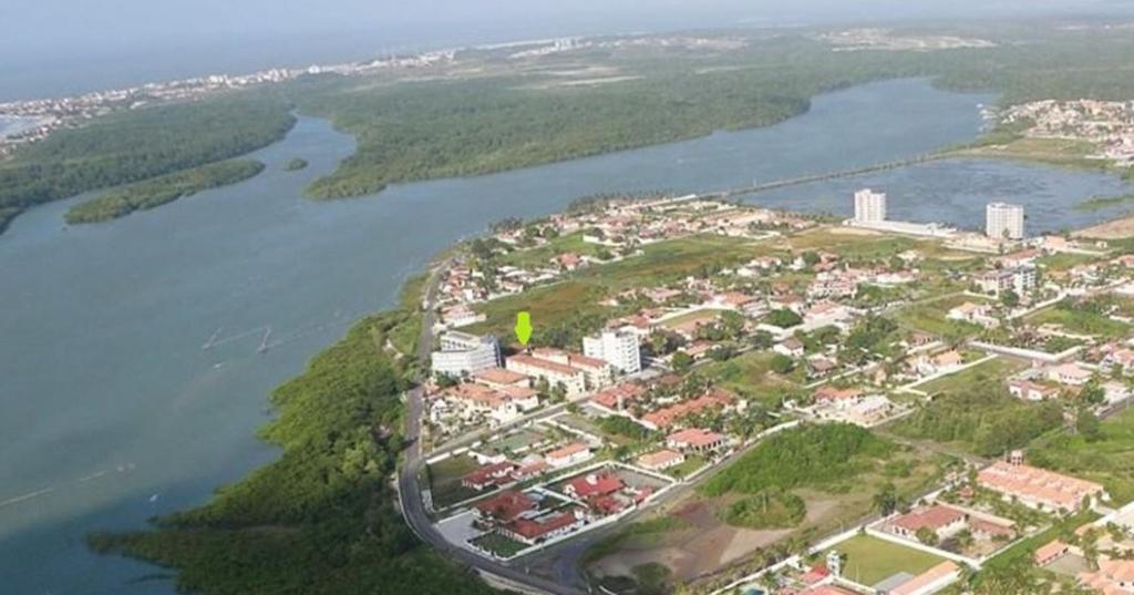 an aerial view of a city next to a river at Atlantico Norte - Salinopolis/PA in Salinópolis