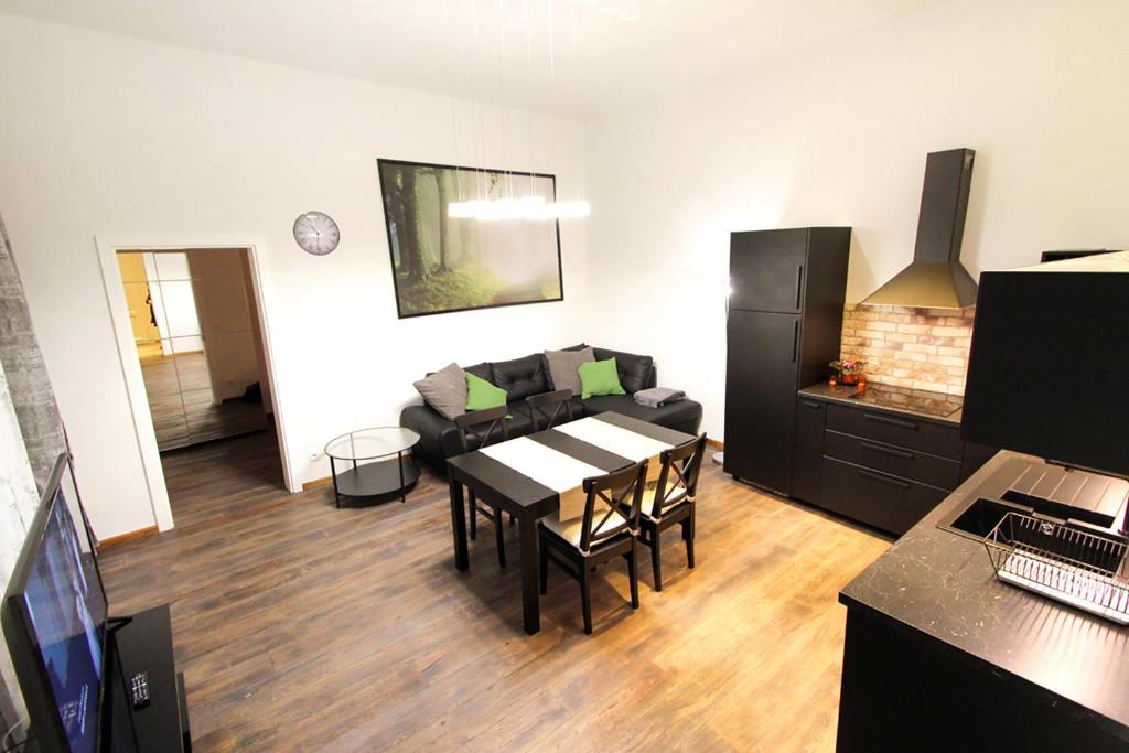 Televiisor ja/või meelelahutuskeskus majutusasutuses Lana Appartements