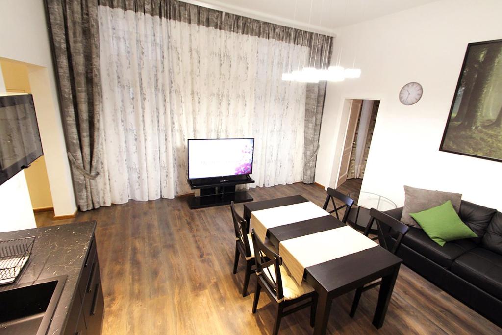Televiisor ja/või meelelahutuskeskus majutusasutuses Lana Appartements
