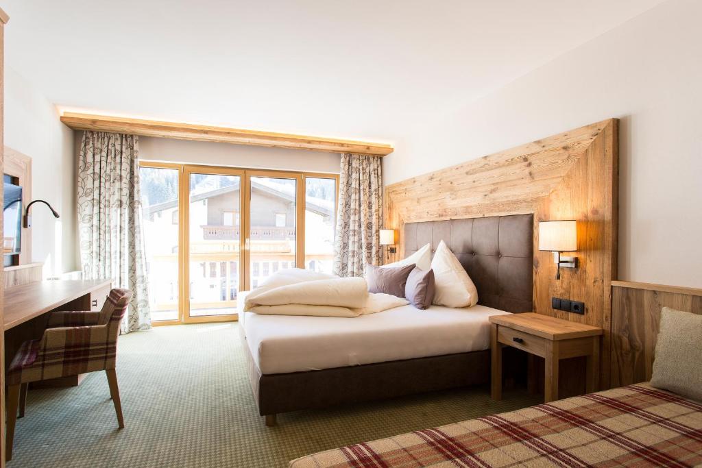 Postel nebo postele na pokoji v ubytování Hotel Glöckner und Hotel Residenz Glöckner