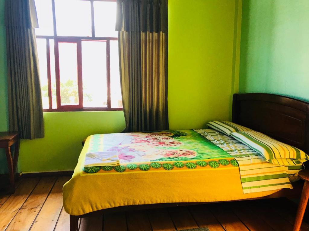Postel nebo postele na pokoji v ubytování Hostal Princesa Maria