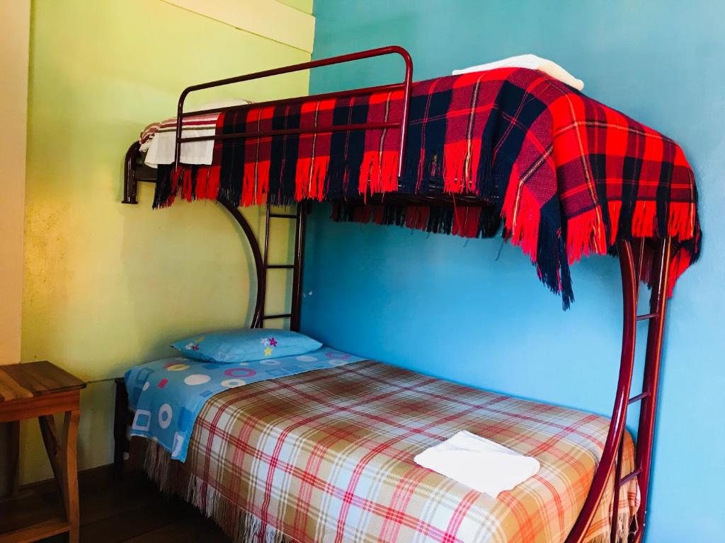 Postel nebo postele na pokoji v ubytování Hostal Princesa Maria