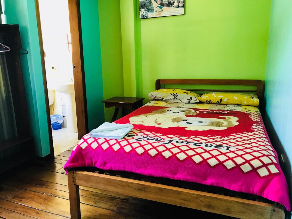 Postel nebo postele na pokoji v ubytování Hostal Princesa Maria