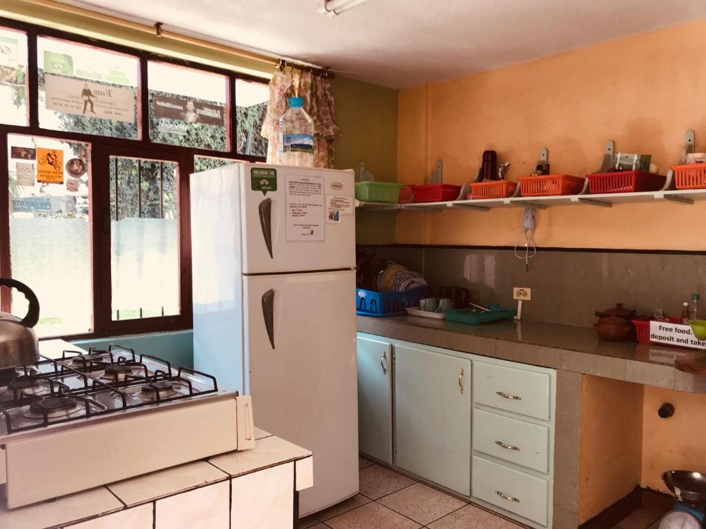Kuchyň nebo kuchyňský kout v ubytování Hostal Princesa Maria