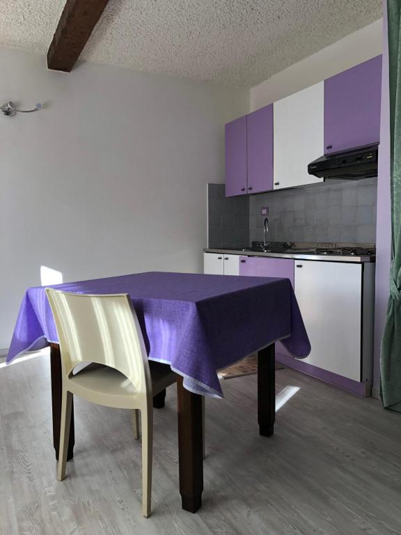 Kuchyň nebo kuchyňský kout v ubytování Albergo La Perla