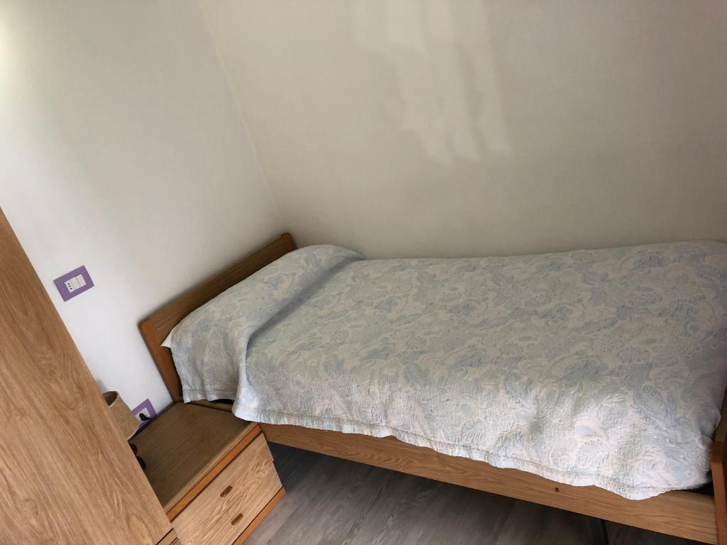 Postel nebo postele na pokoji v ubytování Albergo La Perla