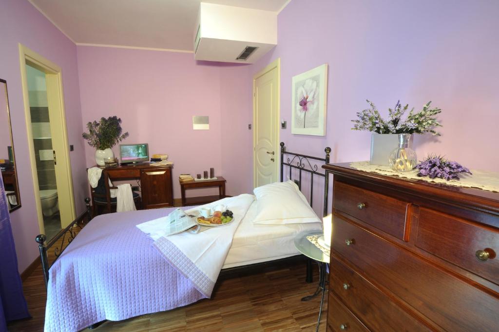 Letto o letti in una camera di Villa Vecchio