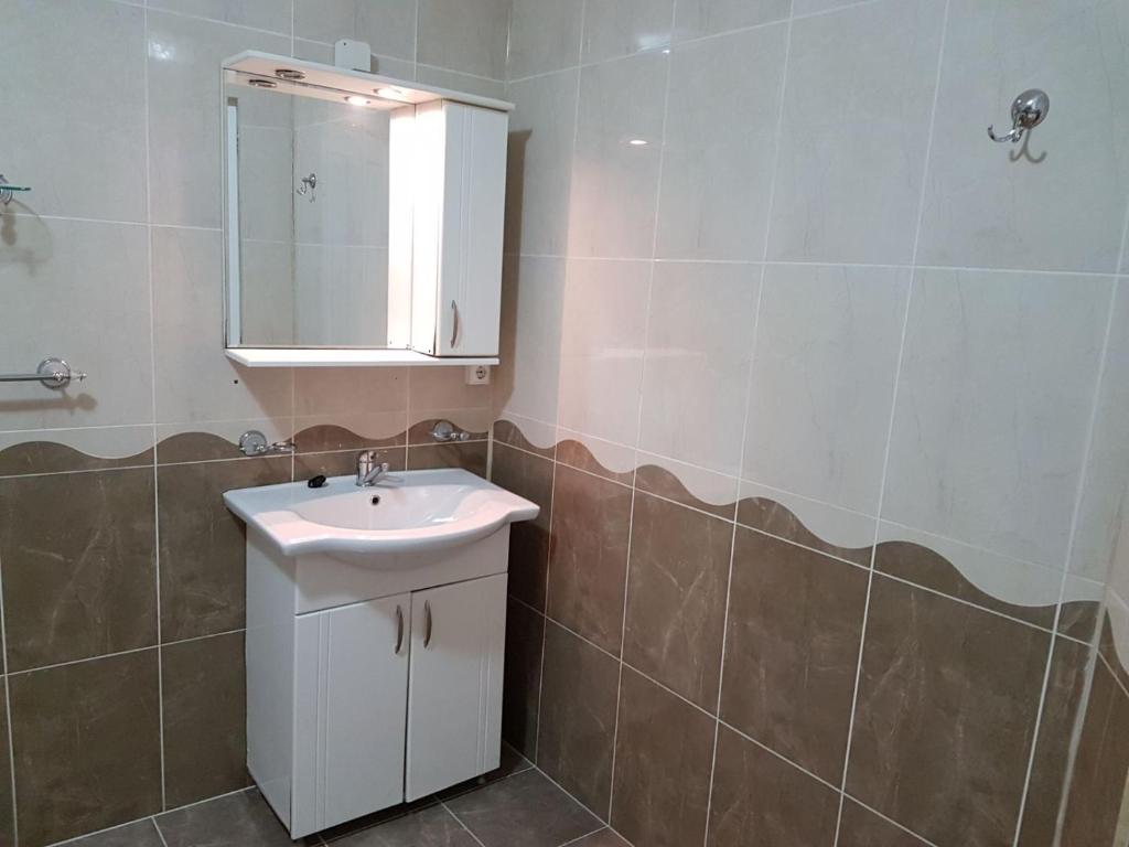 Koupelna v ubytování BigCitty Rooms