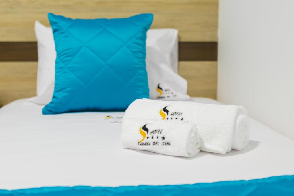 Ένα ή περισσότερα κρεβάτια σε δωμάτιο στο Hotel Sabana del Sinu