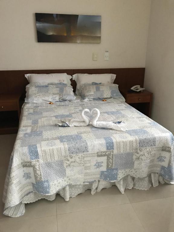 Postel nebo postele na pokoji v ubytování Flat Na Praia da Costa