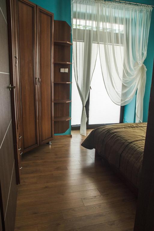 Postel nebo postele na pokoji v ubytování Apartament Premium Delux