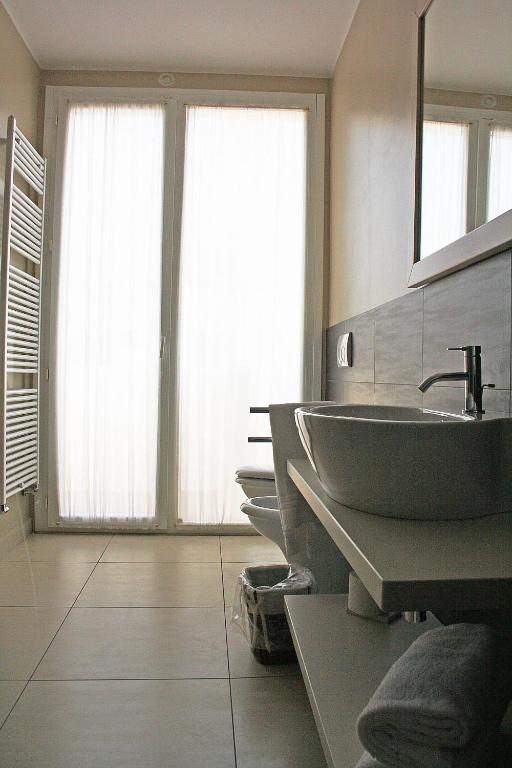 Koupelna v ubytování Hotel Universal