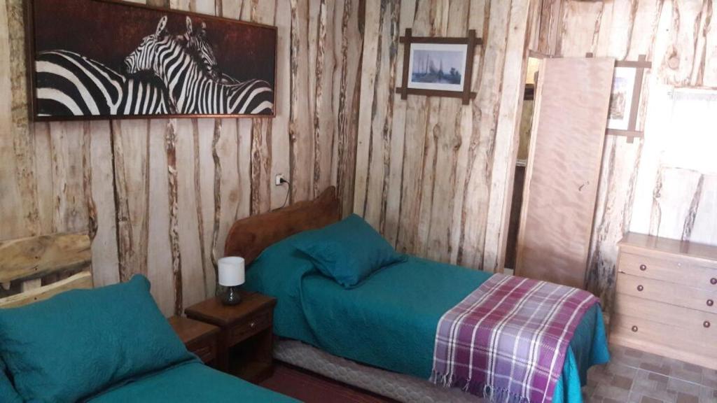 Katil atau katil-katil dalam bilik di Hostal Los Guindos