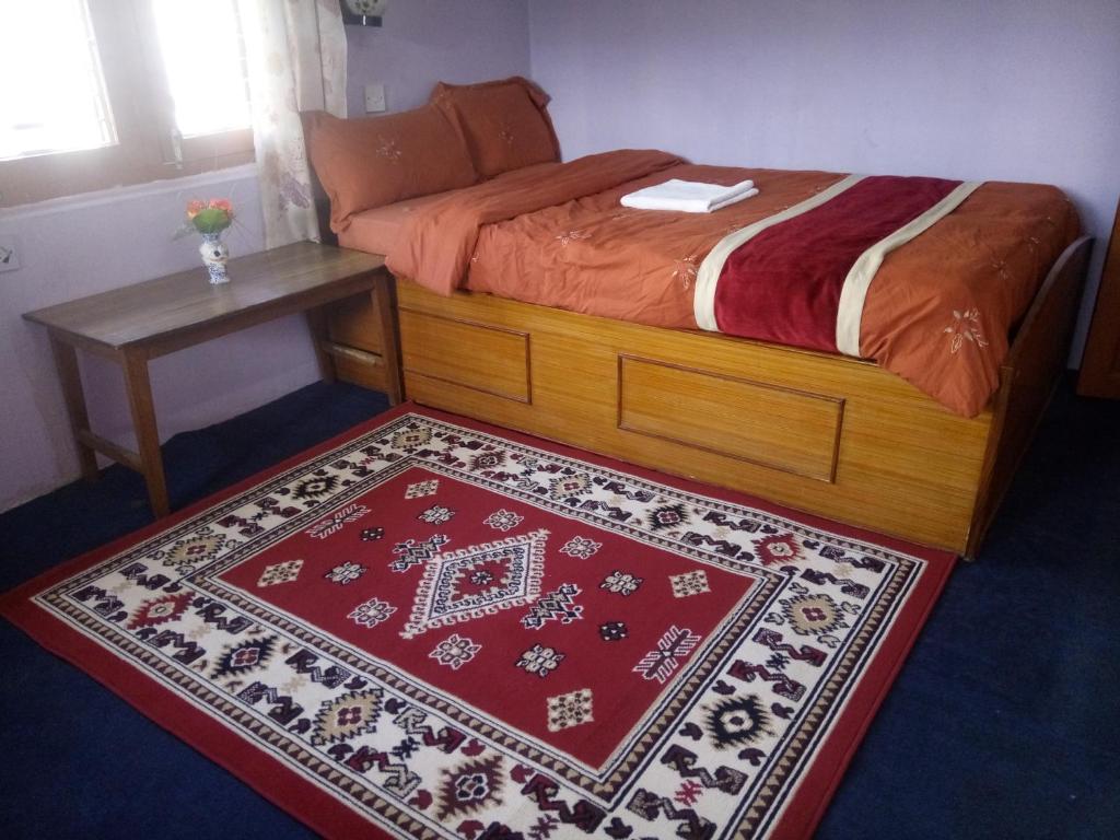 Letto o letti in una camera di Galaxy Inn Guest House