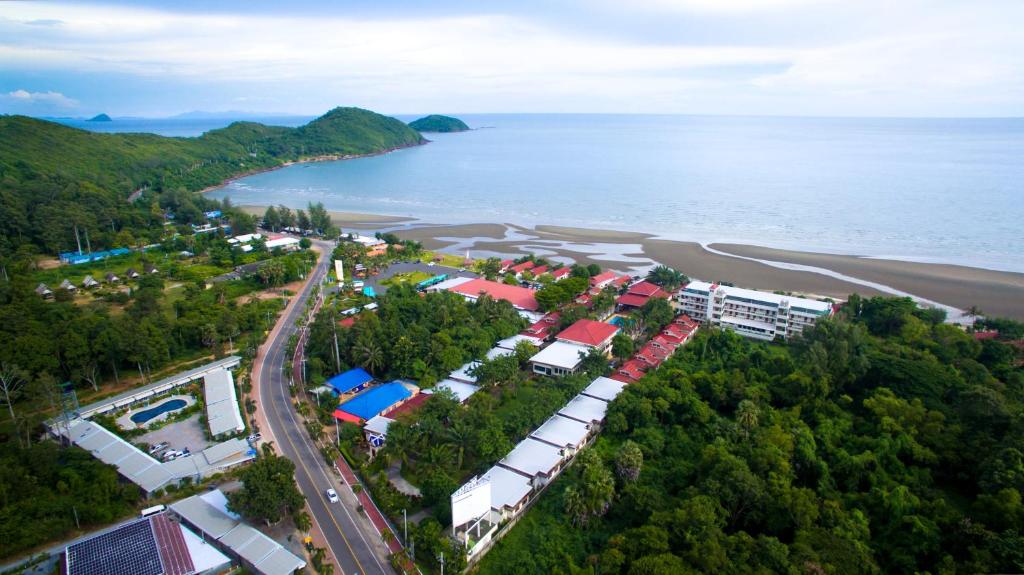 an aerial view of a resort next to the beach at New Travel Beach Hotel & Resort in Chao Lao Beach