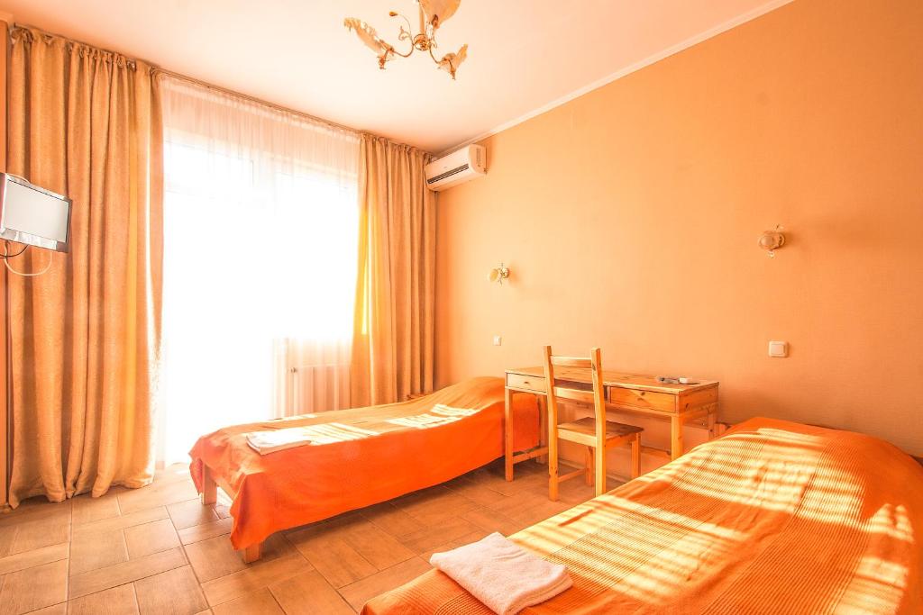Cama o camas de una habitación en Guest House on Trostnikovaya Street