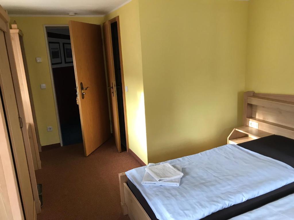 Postel nebo postele na pokoji v ubytování Gasthof zur Hoffnung