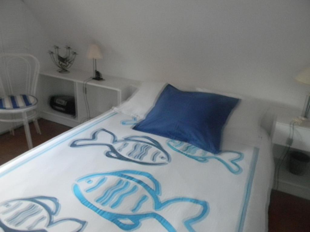 Postel nebo postele na pokoji v ubytování À l'Approche de la Mer