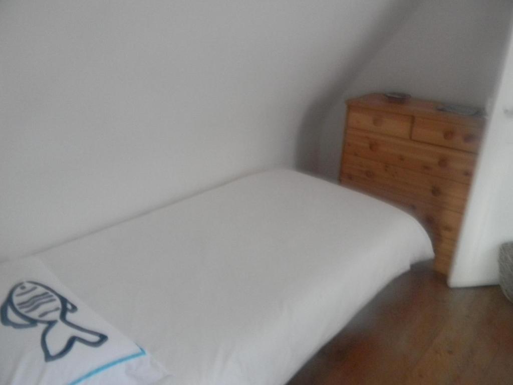 Postel nebo postele na pokoji v ubytování À l'Approche de la Mer