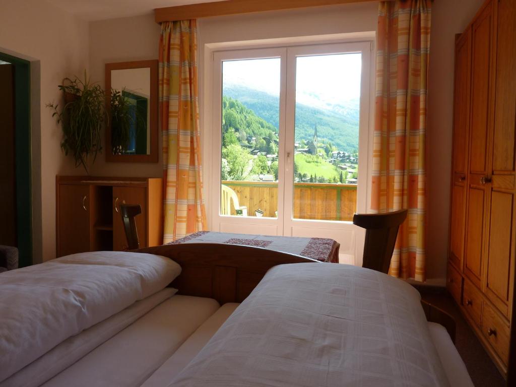 Postel nebo postele na pokoji v ubytování Pension Appartement Ambrosi