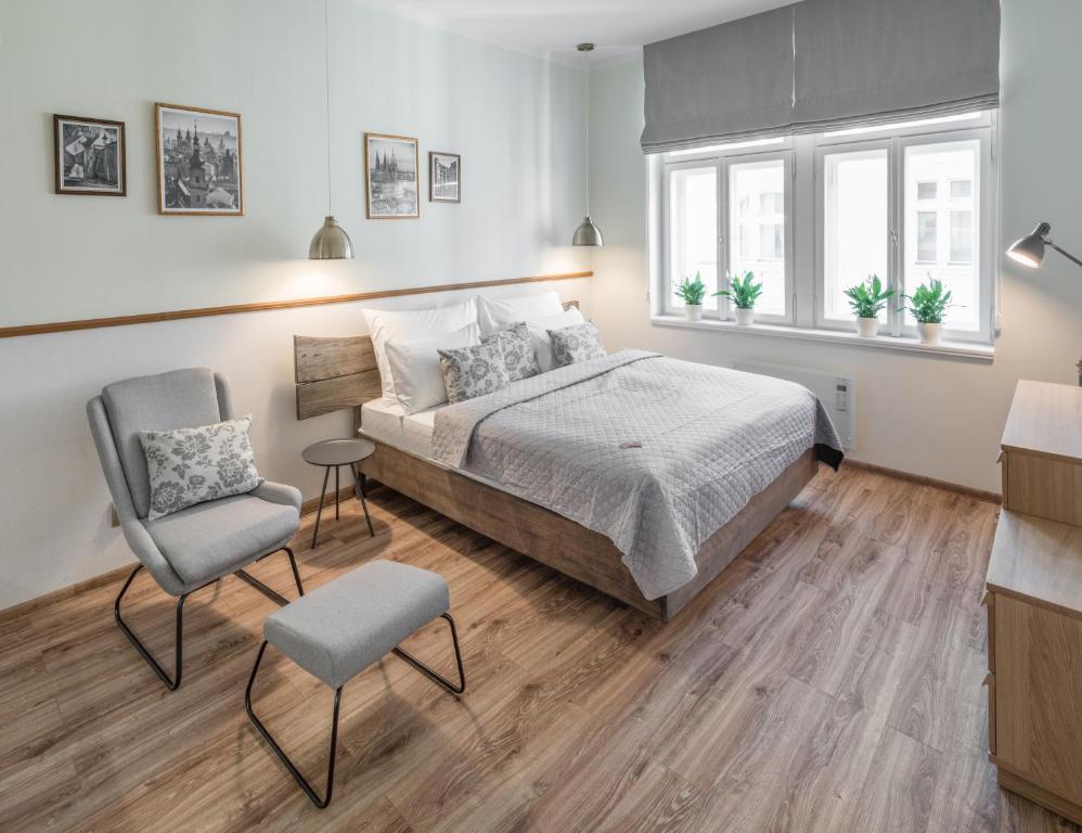 Łóżko lub łóżka w pokoju w obiekcie Mordecai 12 Apartments by Adrez