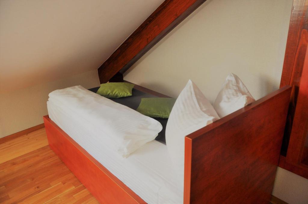 Postel nebo postele na pokoji v ubytování Hotel Noble