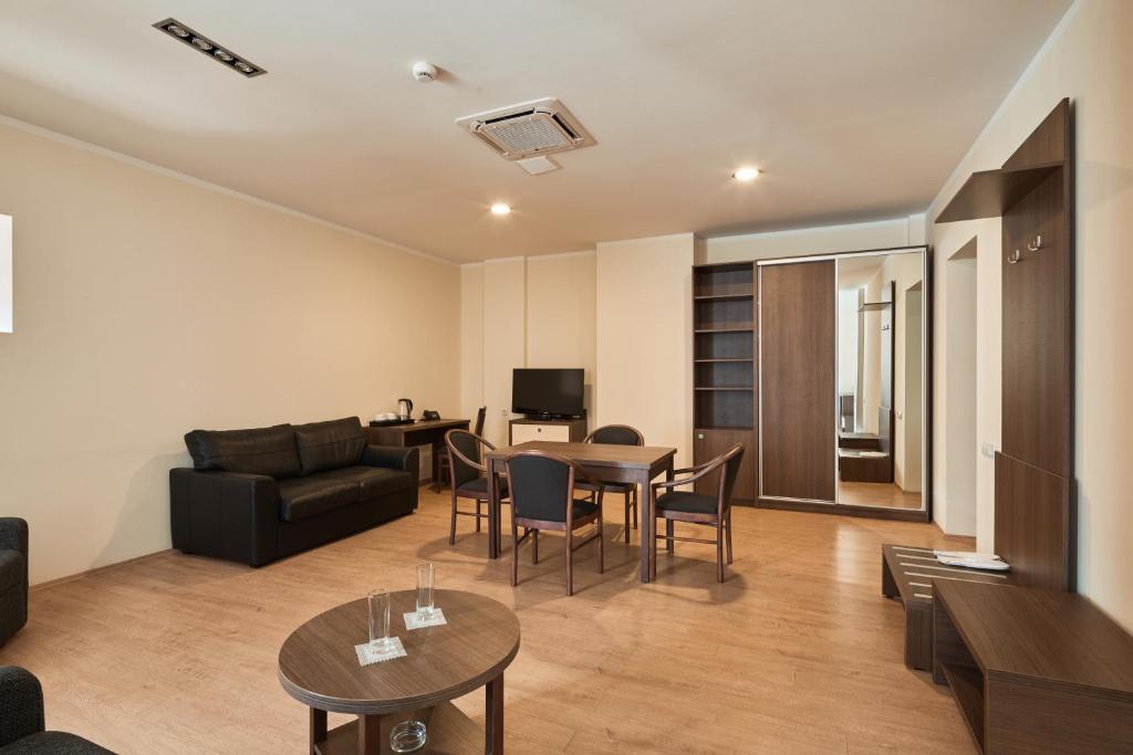 TV a/nebo společenská místnost v ubytování Hotel Gino Wellness Rabath