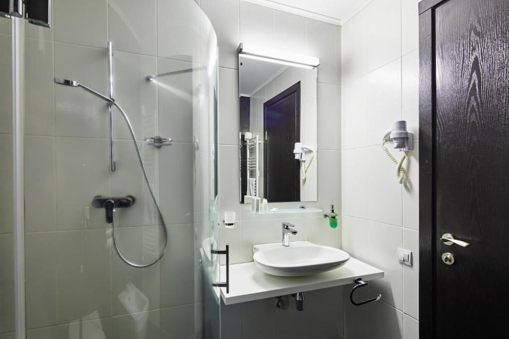 Koupelna v ubytování Hotel Gino Wellness Rabath