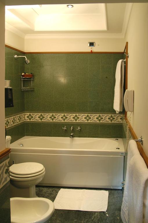 Koupelna v ubytování Hotel Flora