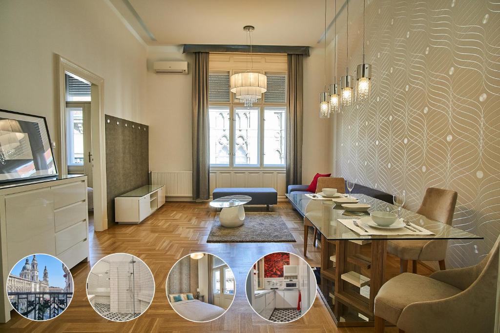 a living room with a couch and a table with mirrors at Basilica Royal Apartment | Budapest in Budapest