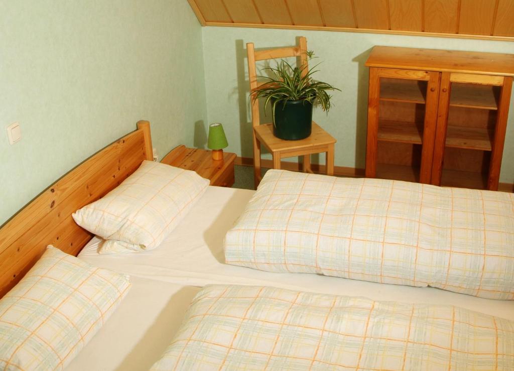 Postel nebo postele na pokoji v ubytování Weingut Blank