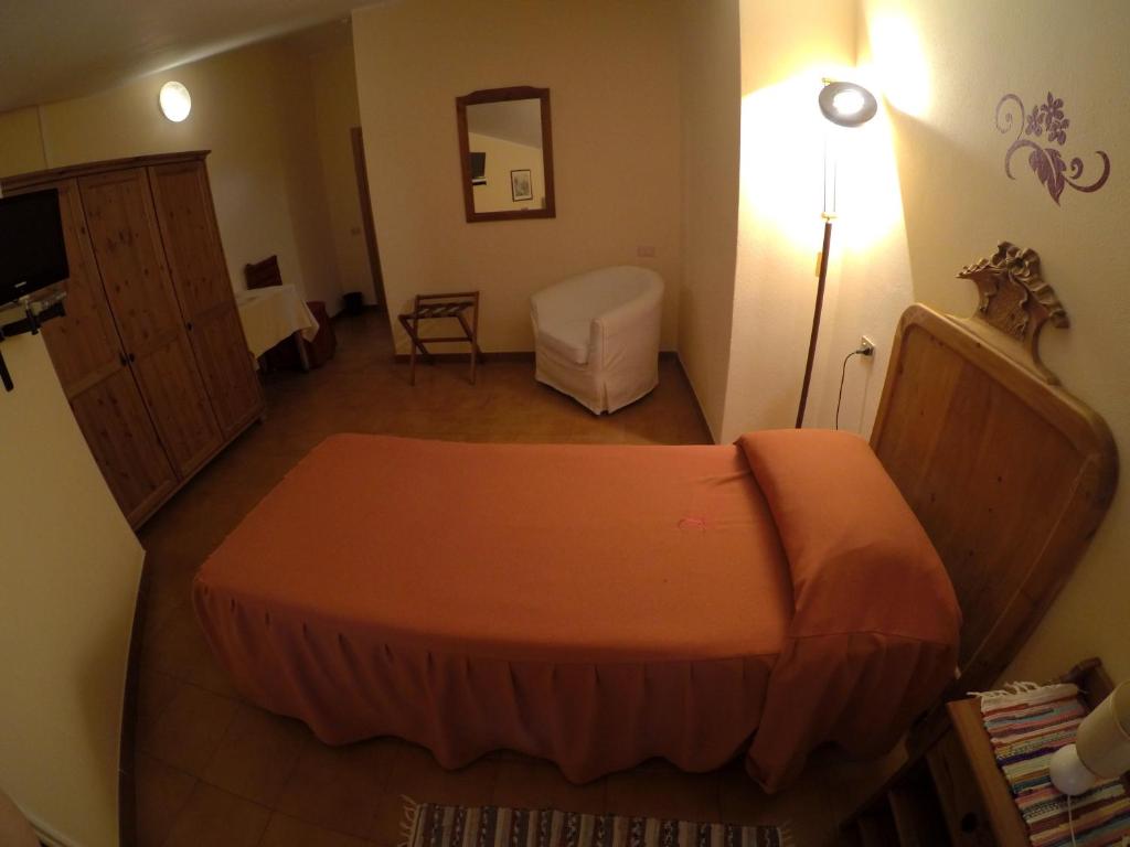 Postel nebo postele na pokoji v ubytování Hotel Ristorante Combolo
