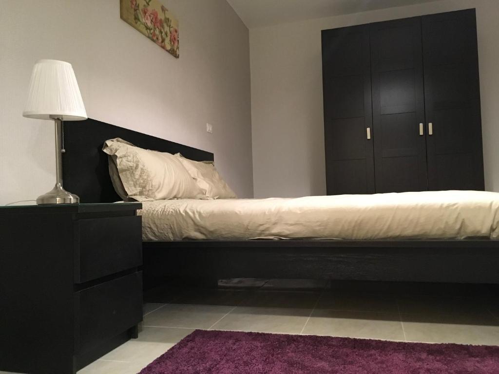 Postel nebo postele na pokoji v ubytování Al-Rehab luxury apartment Families only