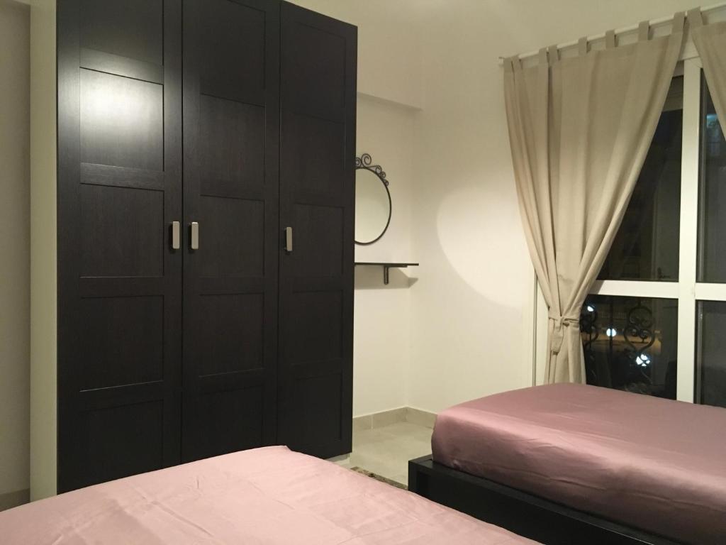 Postel nebo postele na pokoji v ubytování Al-Rehab luxury apartment Families only