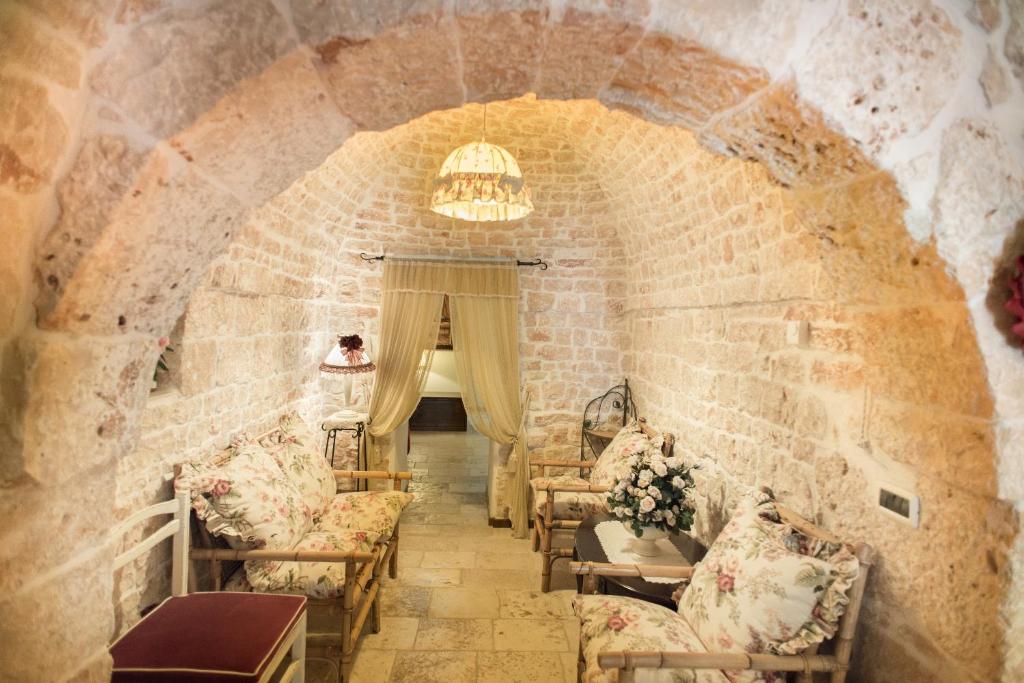 Posezení v ubytování Romantic Trulli