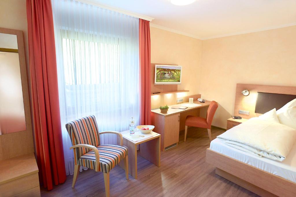 Postel nebo postele na pokoji v ubytování Hotel Waldlust
