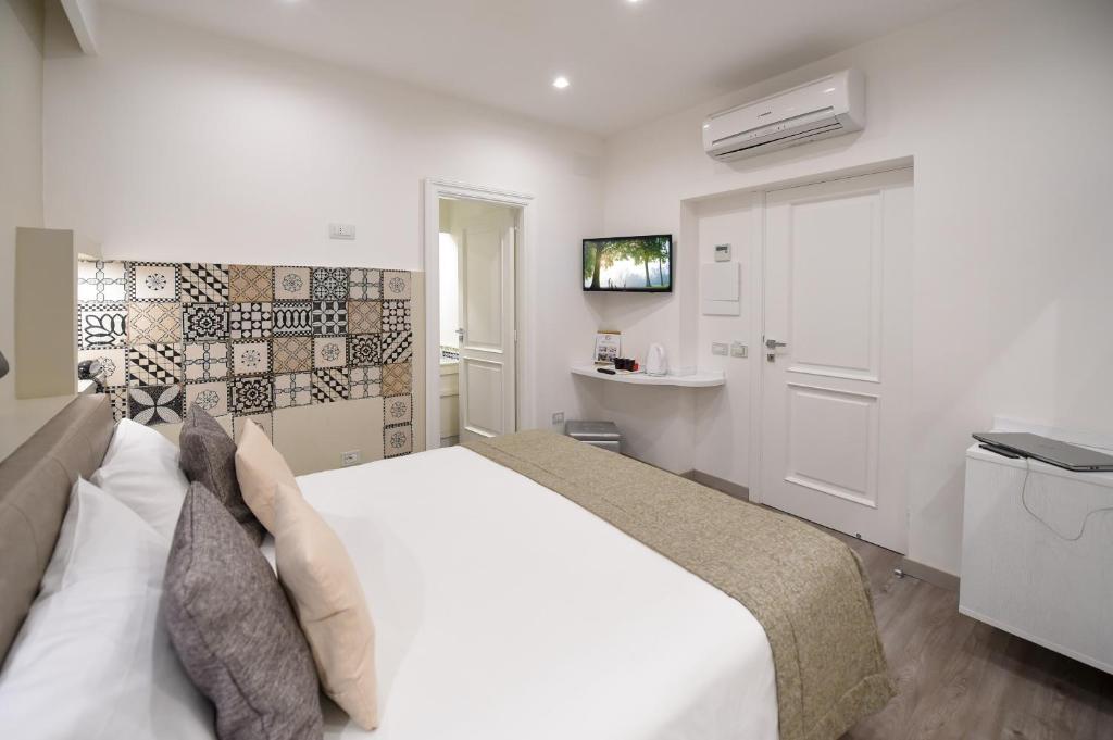 TV a/nebo společenská místnost v ubytování Hotel Sorrento City