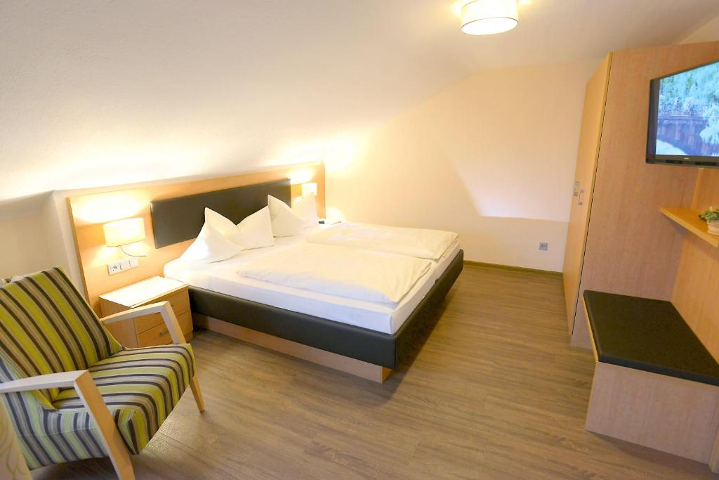 Postel nebo postele na pokoji v ubytování Hotel Waldlust