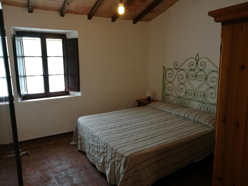 Postel nebo postele na pokoji v ubytování Castello di Selvole