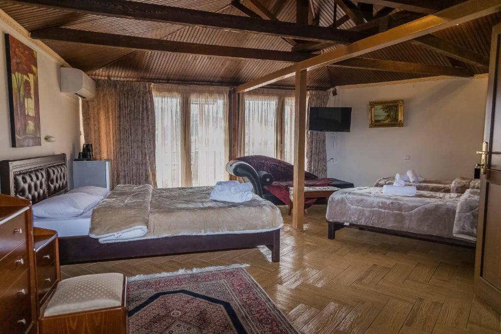 Кровать или кровати в номере Aeolic Star Hotel