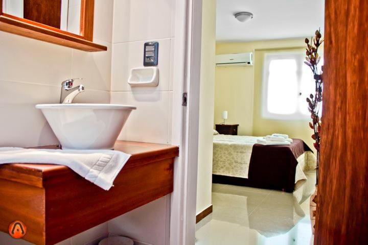 Postel nebo postele na pokoji v ubytování Hotel Esmeralda