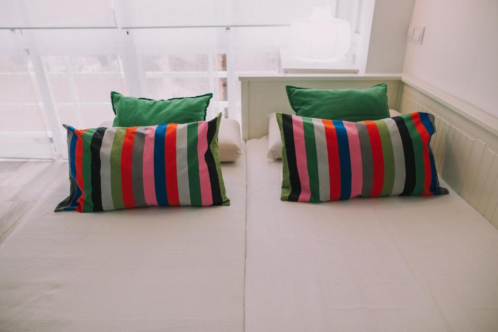 Posteľ alebo postele v izbe v ubytovaní Apartamento Malagueta Playa